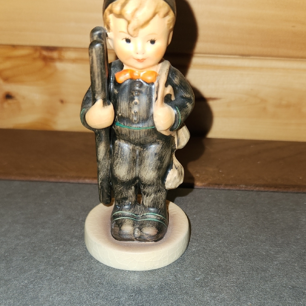 Final Price/Hummel Black and Orange Boy Figurine